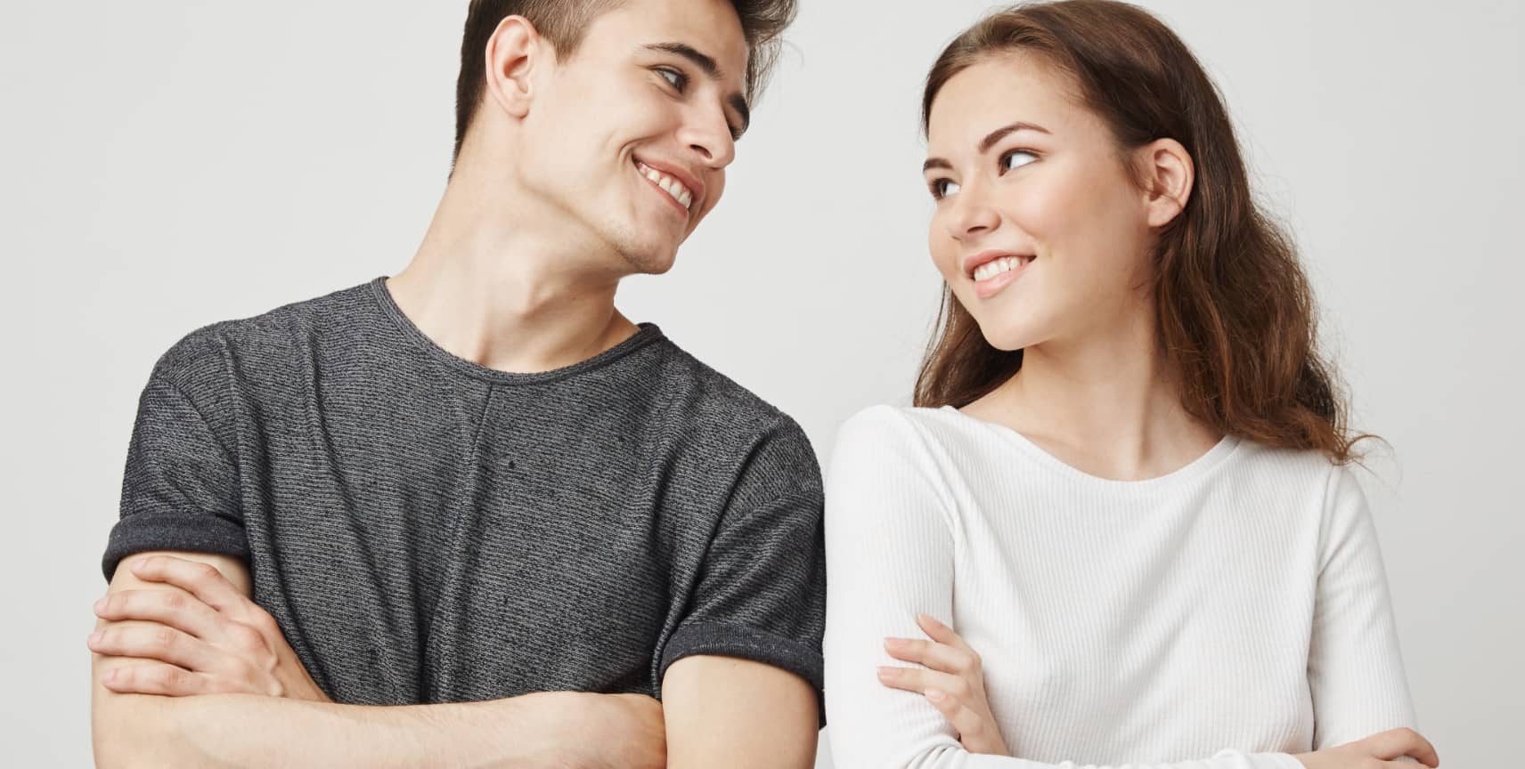 (mood support)lovely-couple-looking-each-other-with-crossed-hands-while-smiling
